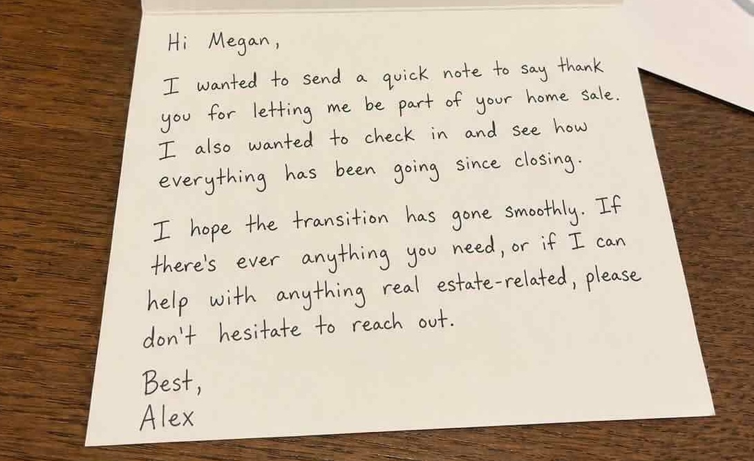 Handwritten thank-you note on a table